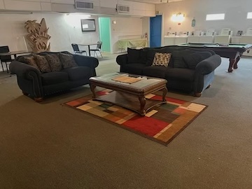 Windswept RV park with amazing amenities like pool table, TV Loune and Large washer dryer area