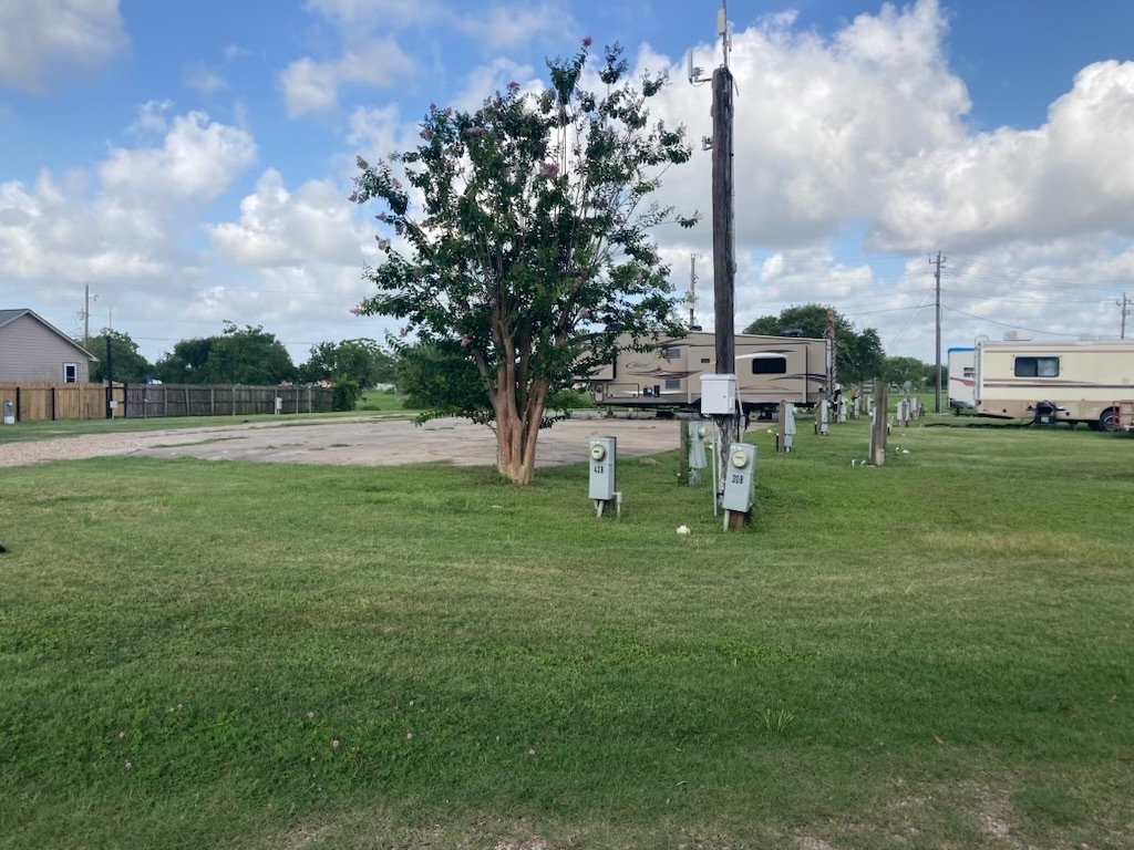 Level grassy sites with full-hookup water and electric pedestals